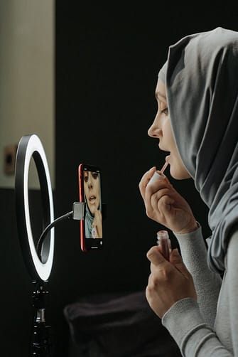 makeup artists using ring light