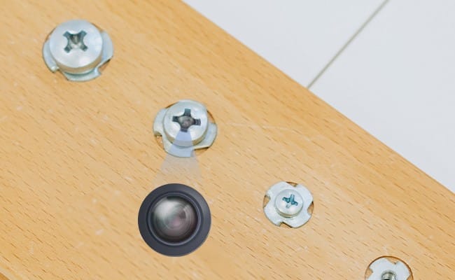 screws with a concealed camera.